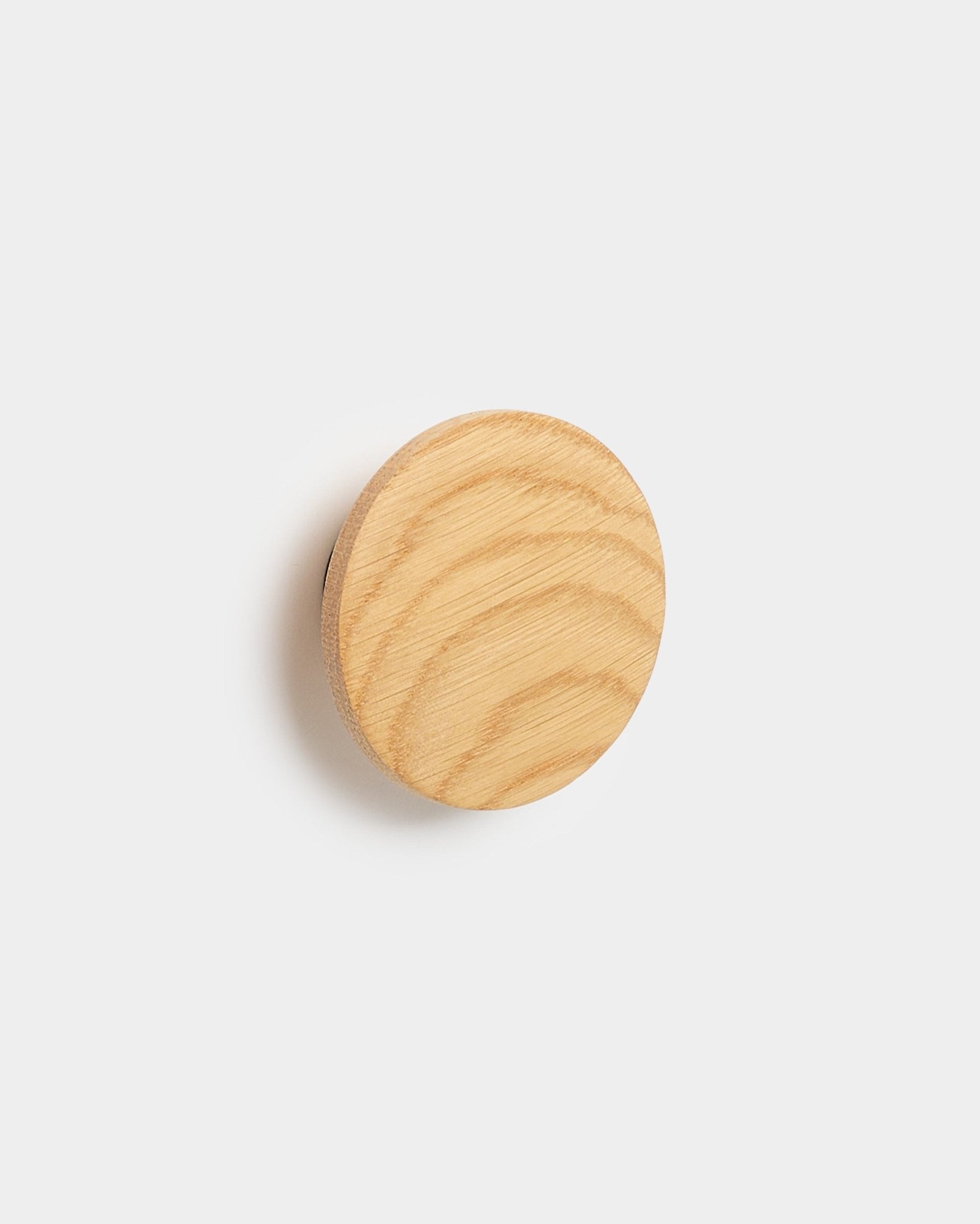 Linn I Single Hanger by WoodUpp, a natural oak accessory with visible wood grain, designed for Akupanel acoustic panels, on a plain white background.